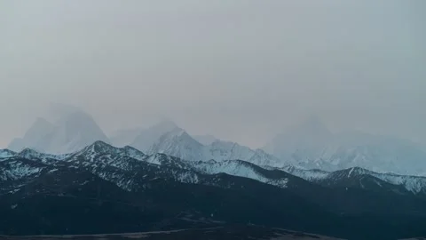 Clouds Moving Over Snowy Mountains Timelapse Stock Footage 326701045