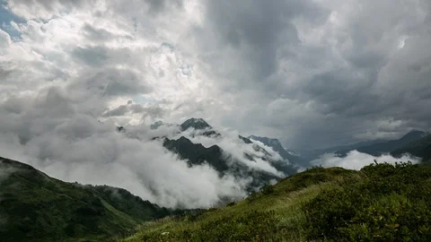 Clouds moving over the summer mountains timelapse Stock-Footage 89755149