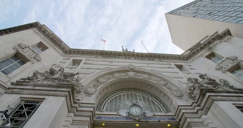 Clouds moving over the top of Waterloo Station London Stock Footage 87341673