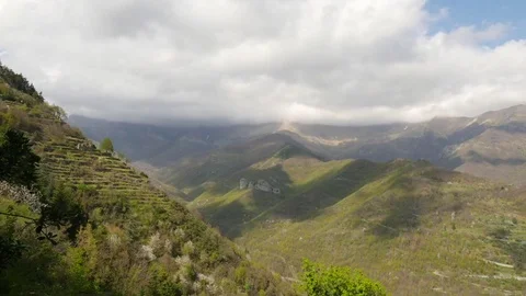 Clouds moving over the vineyards in mountainous region of Nice, France Stock Footage 72983656