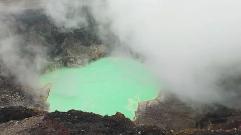 Clouds moving over Volcano in Central America Stock Footage 334086496