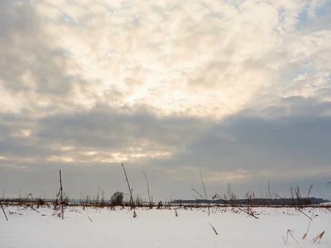 Clouds moving over a winter landscape. Sunny. Timelapse Stock Footage 71775717
