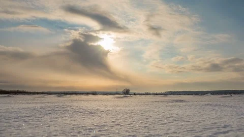 Clouds moving over a winter landscape. Sunny. Timelapse Stock Footage 71780550