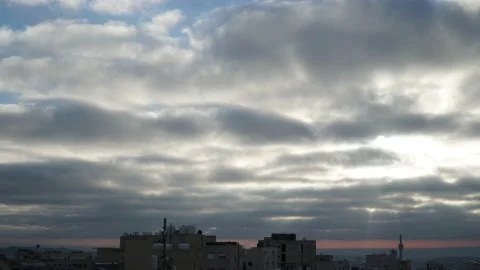 Clouds moving in overcast winter with little sunshine, Amman City, Jordan Stock Footage 168916243