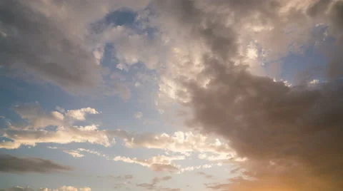 Clouds moving rapidly across the sky during sunset Stock Footage 66395512