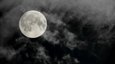 Clouds moving real time across a full moon - a composite shot. 4K tripod Stock Footage 209962603