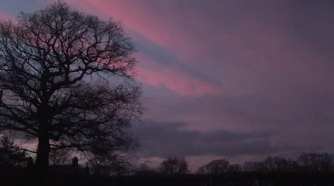 Clouds moving with silhouette tree 스톡 동영상 33848192