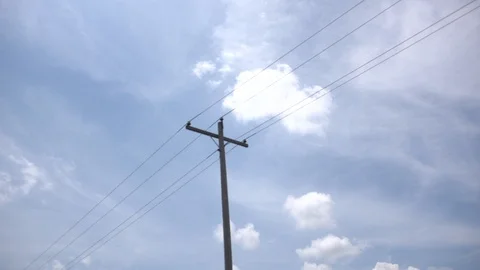 Clouds Moving By in Slow-Motion with Telephone Wires HD Video Stock Footage 90619123
