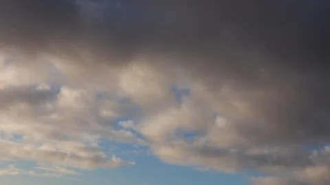 Clouds moving slowly in the sky time lapse Stock Footage 120829668