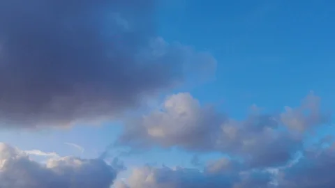 Clouds moving slowly in the sky time lapse Stock Footage 122800535