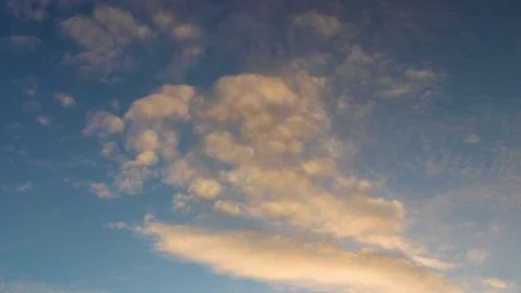 Clouds moving slowly in the sky time lapse Stock Footage 123381342