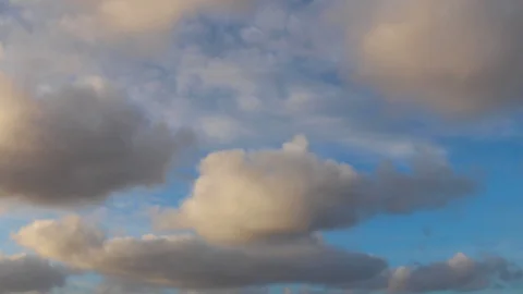 Clouds moving slowly in the sky time lapse Stock Footage 123610376