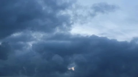 Clouds moving slowly in the sky time lapse Stock Footage 123998682