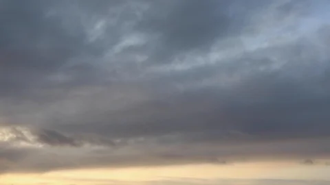 Clouds moving slowly in the sky time lapse Stock Footage 123998829