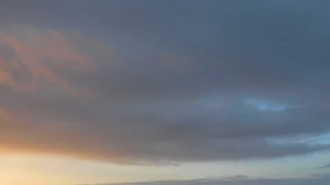 Clouds moving slowly in the sky time lapse Stock Footage 123998905