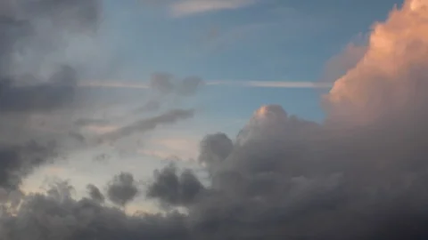 Clouds moving slowly in the sky time lapse Stock Footage 123999107