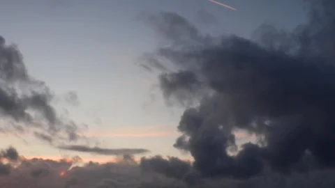 Clouds moving slowly in the sky time lapse Stock Footage 123999383