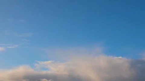 Clouds moving slowly in the sky time lapse Stock Footage 124093608