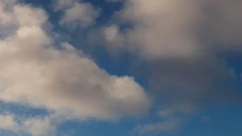 Clouds moving slowly in the sky time lapse Stock Footage 124094046