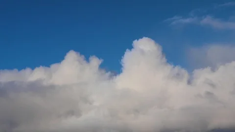 Clouds moving slowly in the sky time lapse Stock Footage 124094201