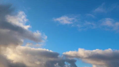 Clouds moving slowly in the sky time lapse Stock Footage 124094605