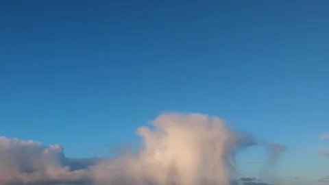 Clouds moving slowly in the sky time lapse Stock Footage 124094855