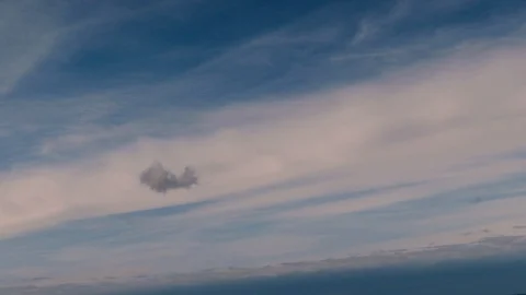 Clouds moving slowly in the sky, time lapse movie Stock Footage 126926312