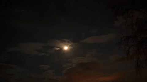 Clouds moving on star filled night sky in moonlight timelapse Stock Footage 60248329
