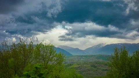 Clouds moving through the Caucasian Mountains and forest of Kuban 4K time lapse Stock Footage 50004496