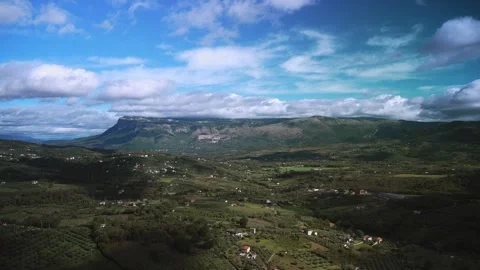 Clouds moving towards the mountains time lapse in Cilento Video stock 255728794