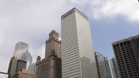 Clouds moving trough skyscrapers in Chicago, Illinois. time lapse Stock Footage 79698376