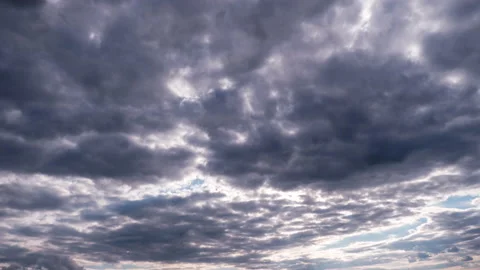 Clouds Moving Under the Sun in the Blue Sky, Timelapse Stock Footage 217014227