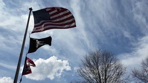 Clouds Moving With USA Flag POW MIA Flag and Ohio State Flag in Sky Stock Footage 332131931