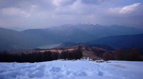 Clouds Moving by Winter Landscape With the Lake Stock Footage 61743748