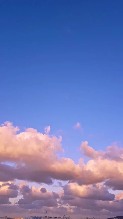 Clouds obscure a large area of the sky, casting shadows over a vast, endles.. Stock Footage 281840977