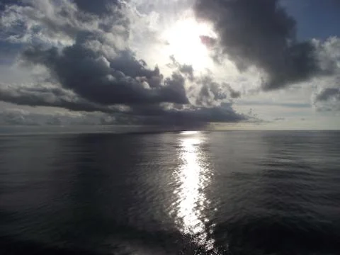 Clouds in the ocean Stock Photos