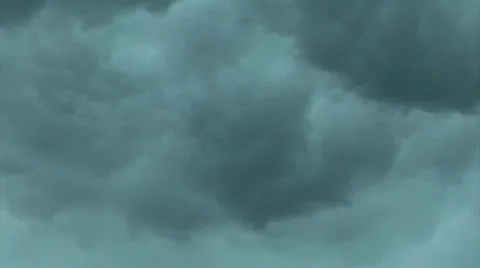 Clouds, ominous storm,  roiling R-L strange green tint Stock Footage 39413566