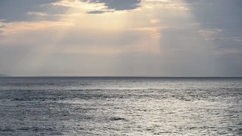 The clouds open and let the sun's rays pass after a storm Video stock 83389789