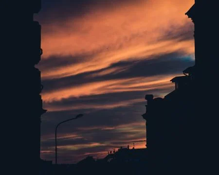 Clouds in the orange sky Stock Photos