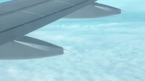 Clouds out of an airplane window 動画素材 84066478