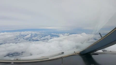Clouds outside plane window Stock Footage 229366075