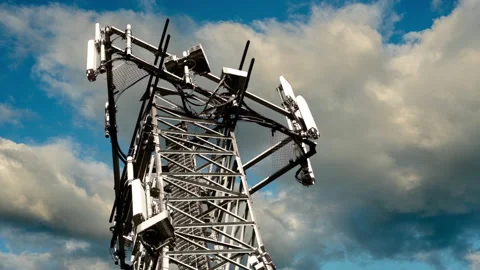Clouds Over The 5G small cell radio antennas tower. Timelapse 4K Video stock 157691726