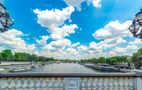 Clouds over Alexander III bridge in Paris 写真素材