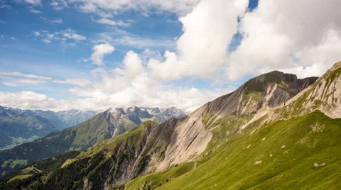 Clouds over alpine mountains time lapse Stock Footage 68907898
