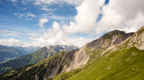 Clouds over alpine mountains time lapse Stock Footage 68908047
