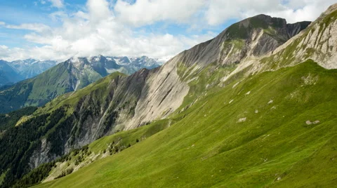 Clouds over alpine mountains time lapse Stock Footage 68908196