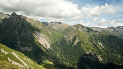 Clouds over alpine mountains time lapse Stock Footage 68908648