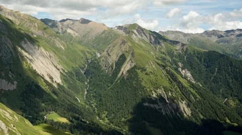 Clouds over alpine mountains time lapse Stock Footage 68908836