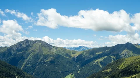 Clouds over alpine mountains time lapse Stock Footage 68909247