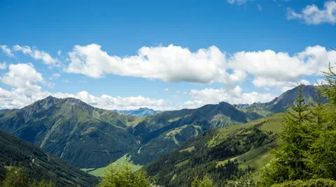 Clouds over alpine mountains time lapse Stock Footage 68910190